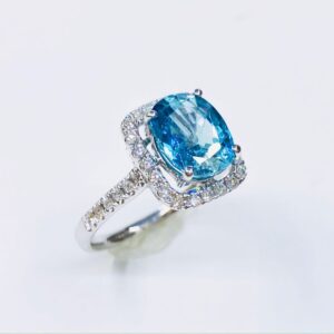 Blue Zircon and diamond ring with cushion cut